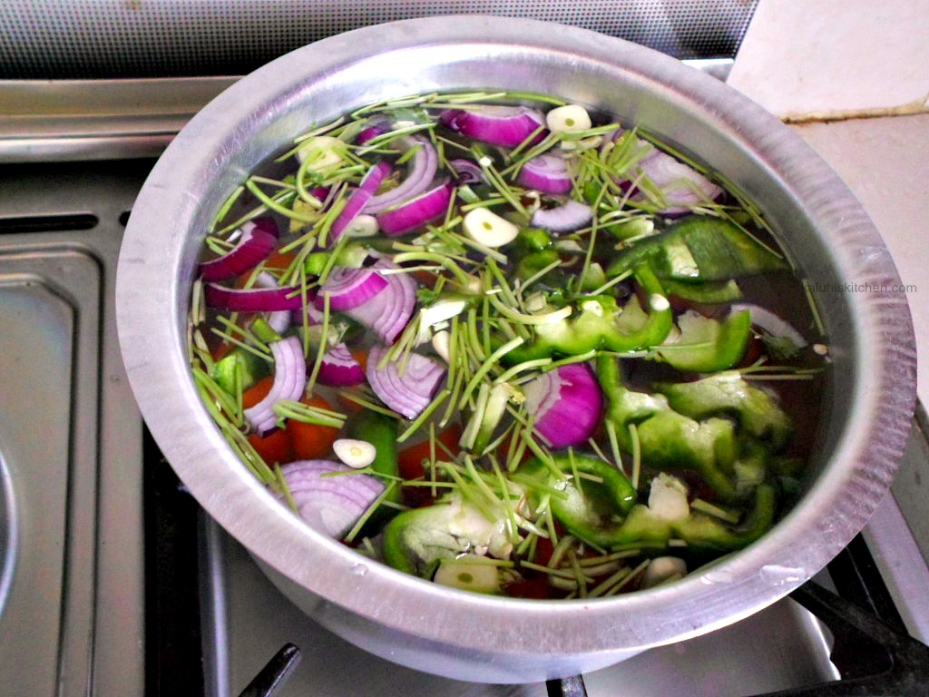 VEGETABLE STOCK INGREDIENTS BROUGHT TO BOIL THE TO SIMMER