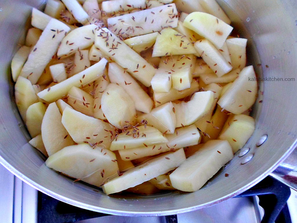 boiling potatoes with cumin