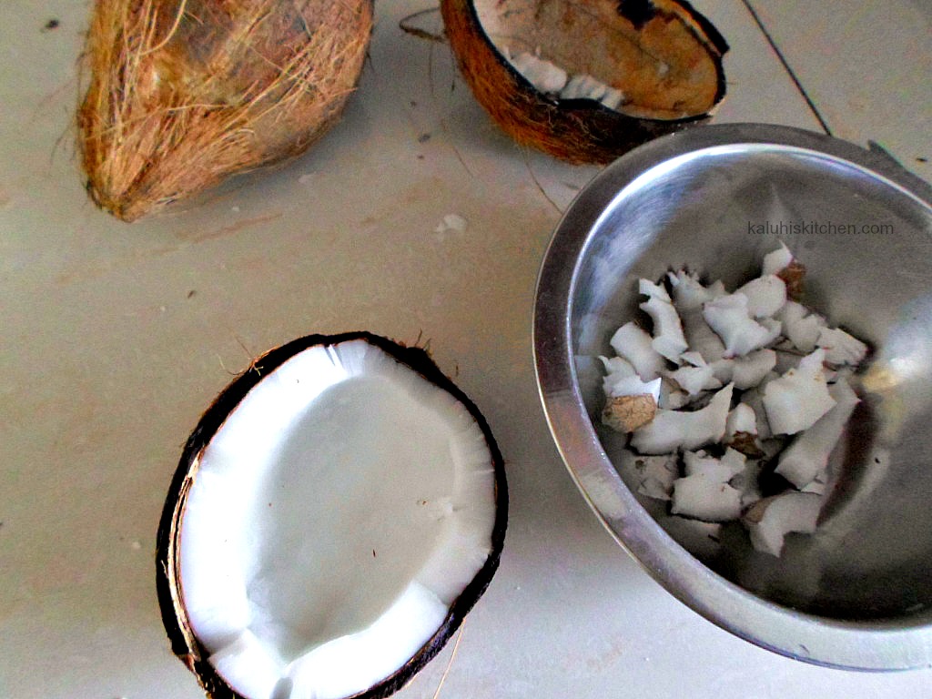 cutting coconut into bowl