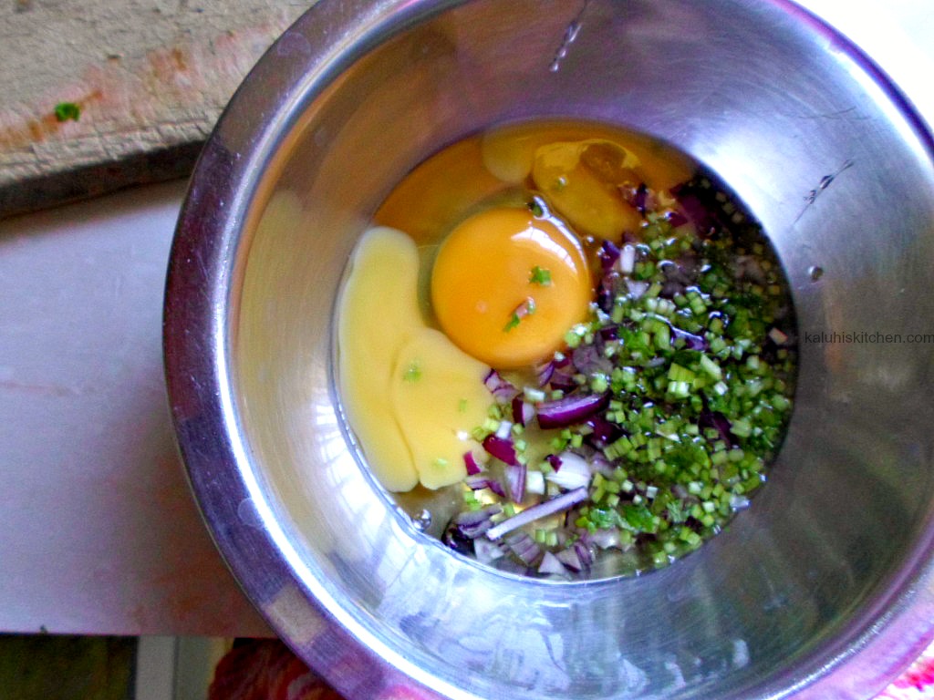 mixing omelette in a tin with onions