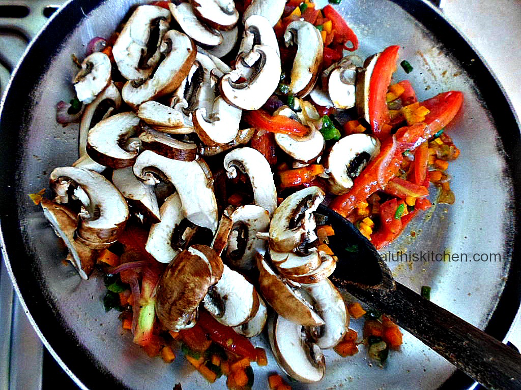 adding mushrooms to carrot and tomato saute_chestnut mushrooms_mushrooms take 5-7 minutes to saute