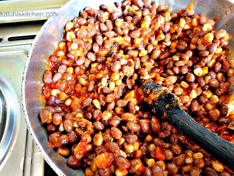 Adding the githeri to the tomato base allows all the flavors to amalgamate and solidify well after simmering