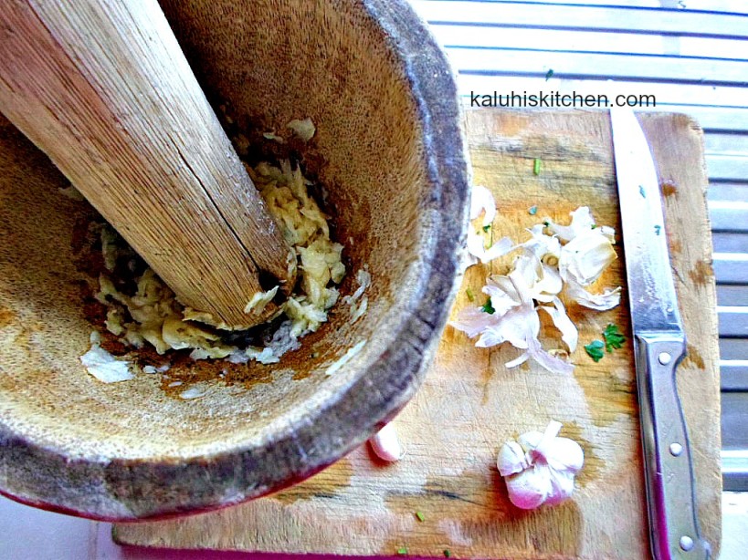 mincing garlic for masala fries_garlic masala fries_kinu-kENYAN FOOD