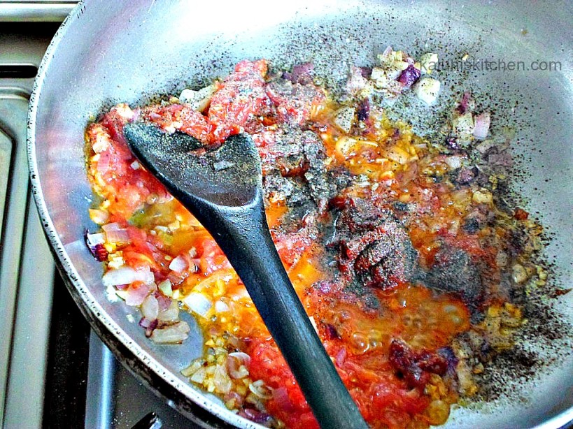 allow tomato paste to cook for afew minutes for it to break down well and remove that metallic taste it inherently has while raw