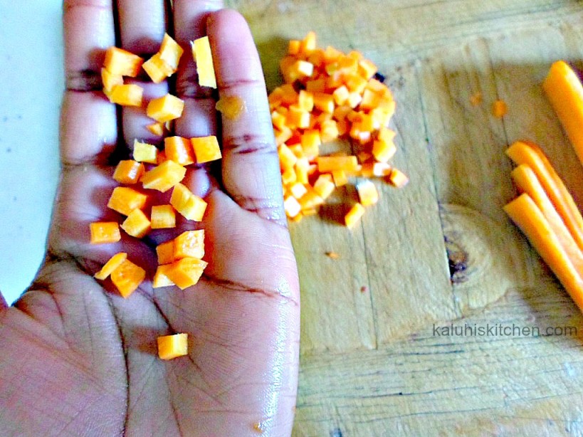 dicing up carrots really small allows them to cook faster and makes the food neater_Kaluhis Kitchen potato stew