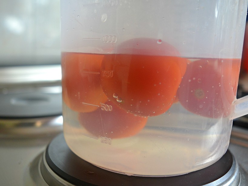 SOAKING TOMATOES IN HOT WATER PEELS AWAY HE SKIN INSTANTLY MAKING COOKING EASIER