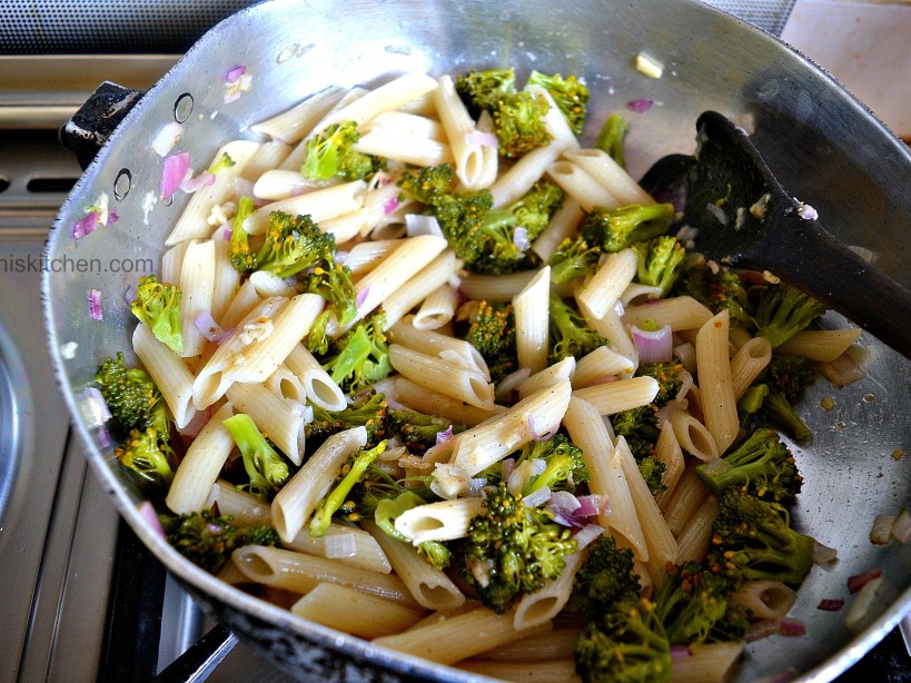 bcause the broccoli is already steamed, it will not take that long to cook, hence making this garlic and broccoli penne into a stir fri_kaluhiskitchen.com