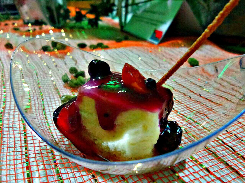 white chocolate cheese cake with a berry coulie at the unveiling of the new menu for FLAME TREE RESTAURANT OF SAROVA PANAFRIC
