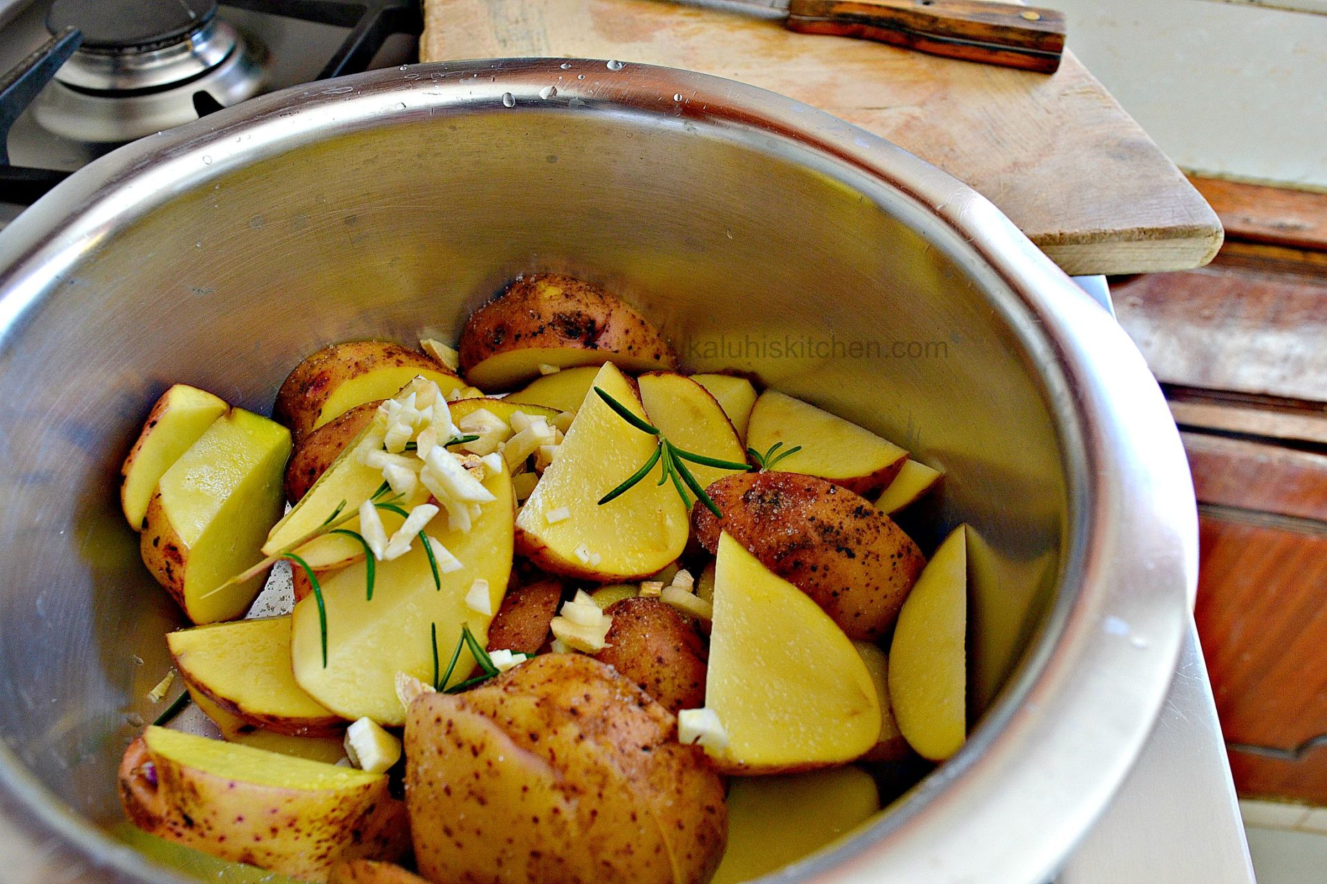 boiling potatoes in fresh rosemary and garlic adds alot of flavor and are well absorbed by the potatoes_kaluhiskitchen.com