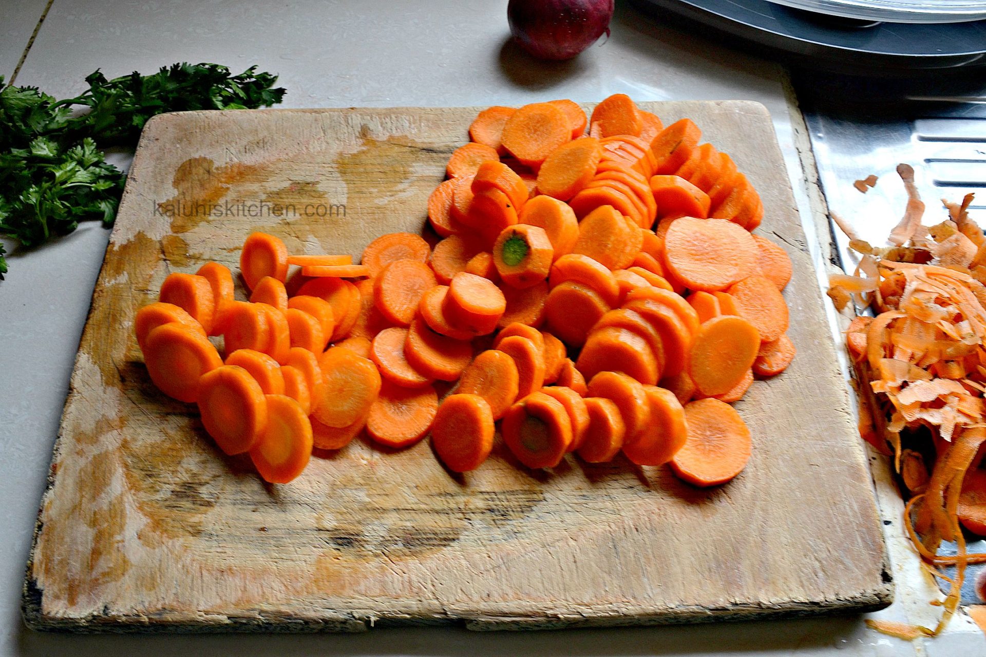 carrots sliced thinely allow them to get cooked alot faster_buttered carrots_kaluhiskitchen.com