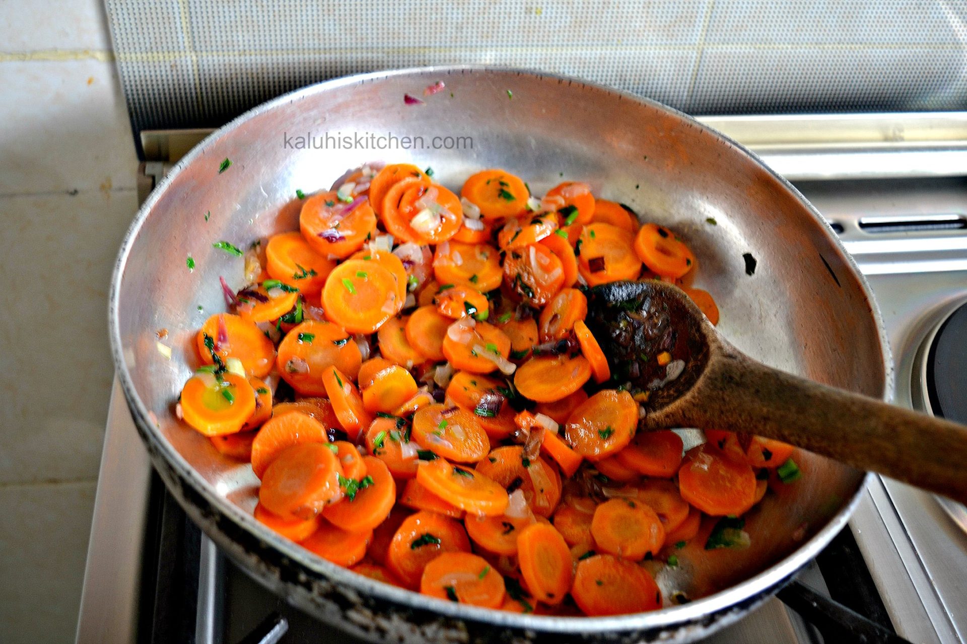 steamed carrots will require just a light sautee since they are already cooked. buttered carrots_carrot recipes_kaluhiskitchen.com
