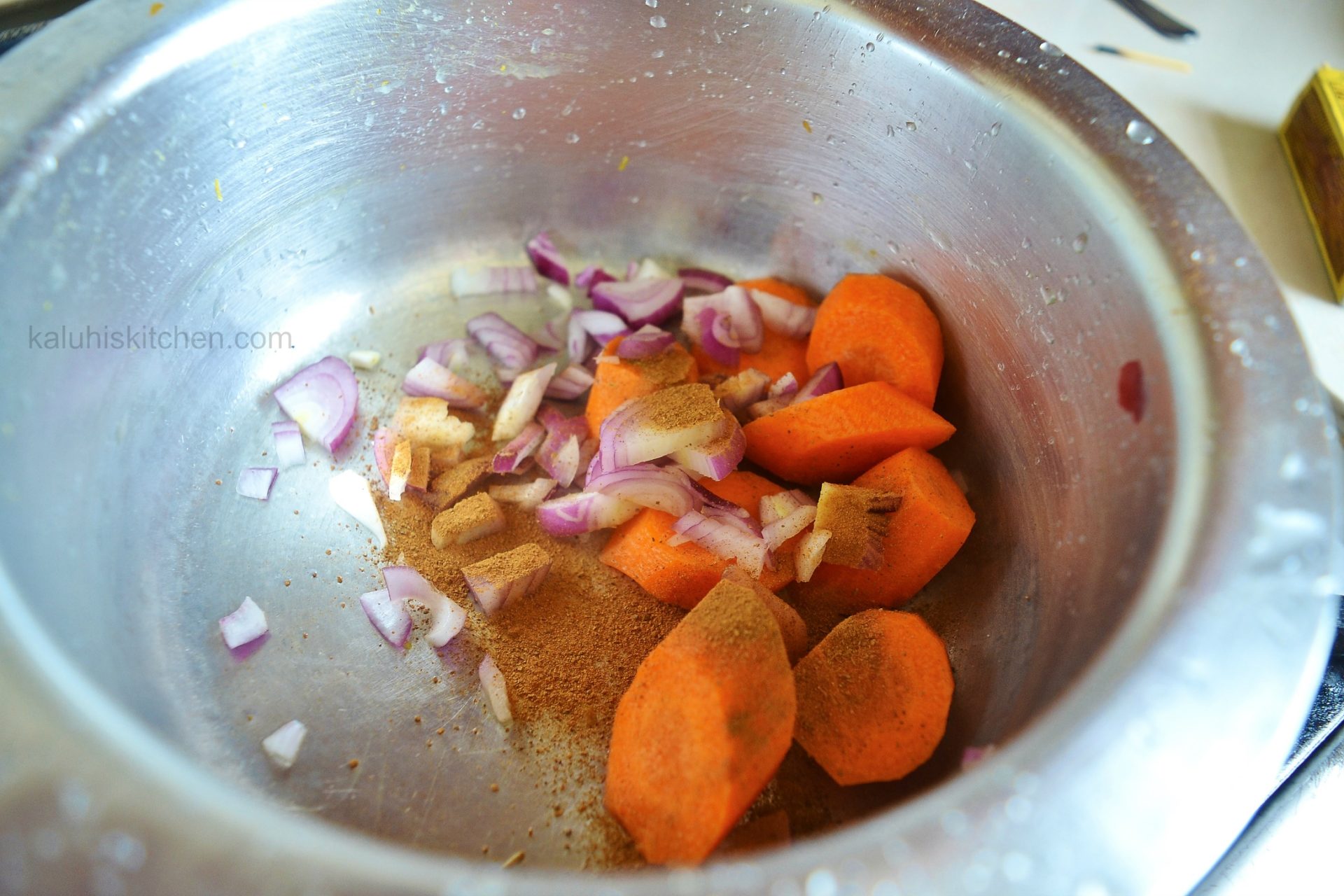 boil the carrots until tender with some onion and cinnamon for the pumpkin soup_kaluhiskitchen.com