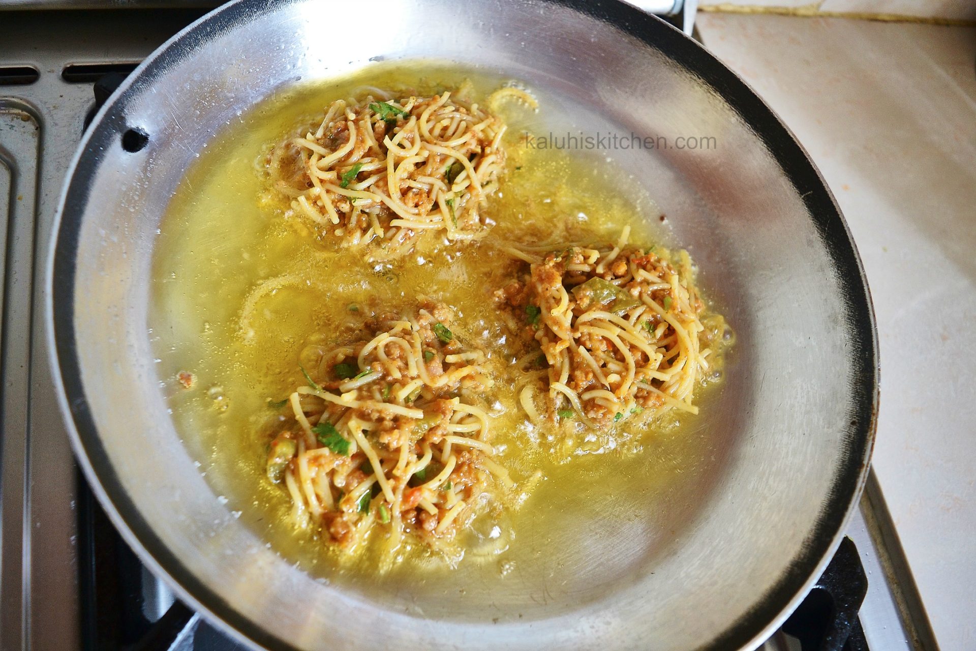 fry the fritters in some oil, not to much but enough to fry_kaluhiskitchen.com