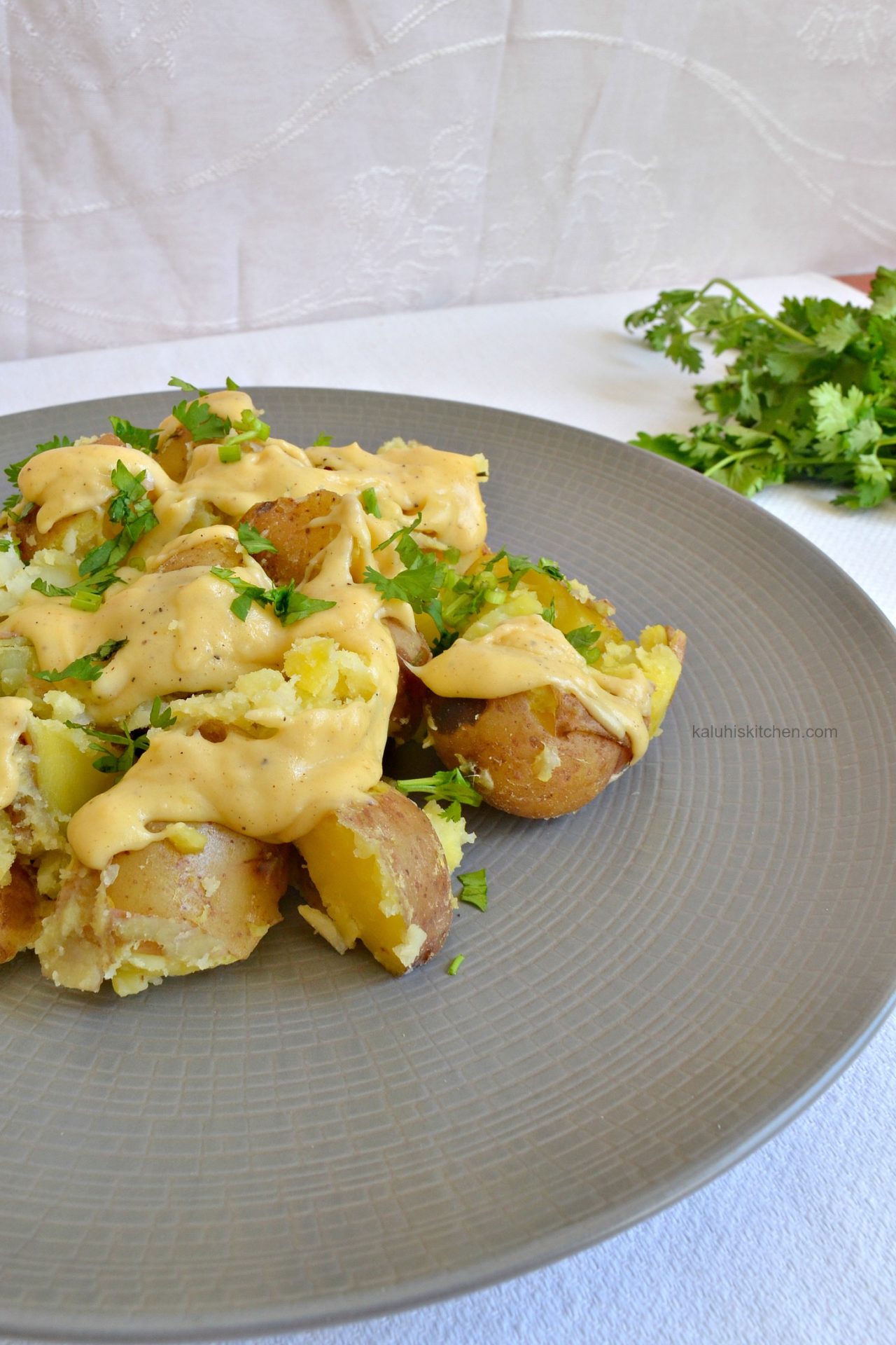 cheddar cheese sauce with smashed potatoes_kaluhiskitchen.com_kenyan food bloggers_