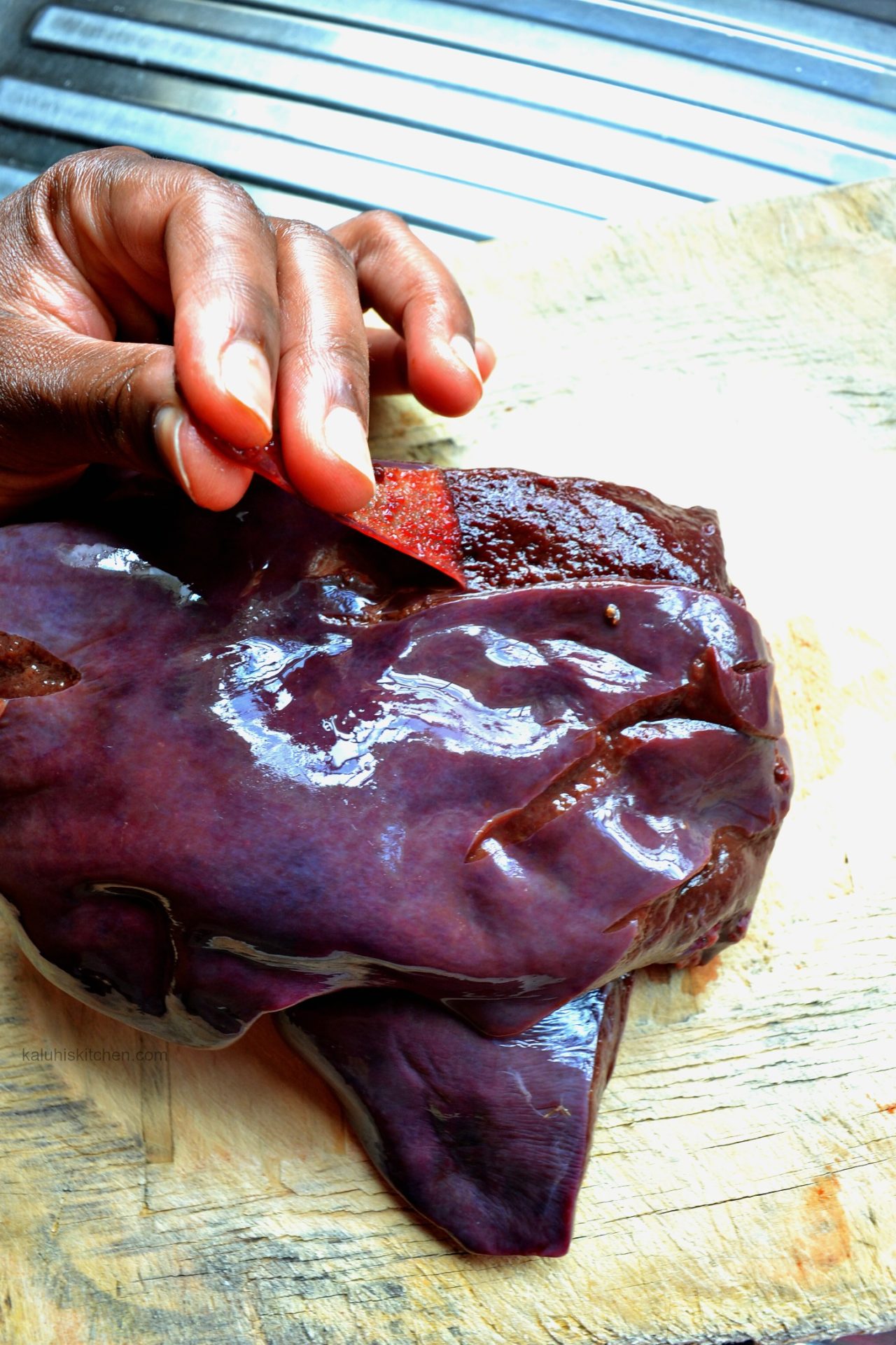 how to cook liver_before cocoking liver, remove the membrane covering the organ to make it soft_kaluhiskitchen.com