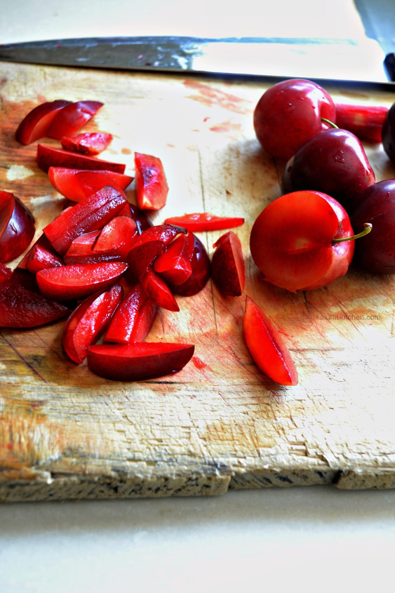 kenyan food_kenyan fruits_kenyan plums are small, about the size of a strawberry and are red though yellow variations exist too