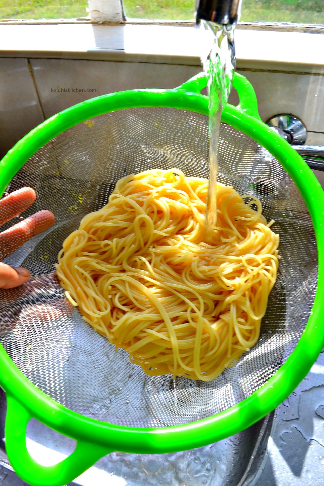 always run your spaghetti over some cold water to prevent it from sticking together_kaluhiskitchen.com