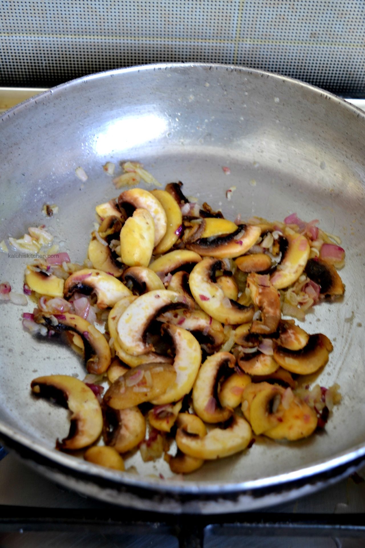 cook the button mushrooms together with the onions until they are just softened_kaluhiskitchen.com