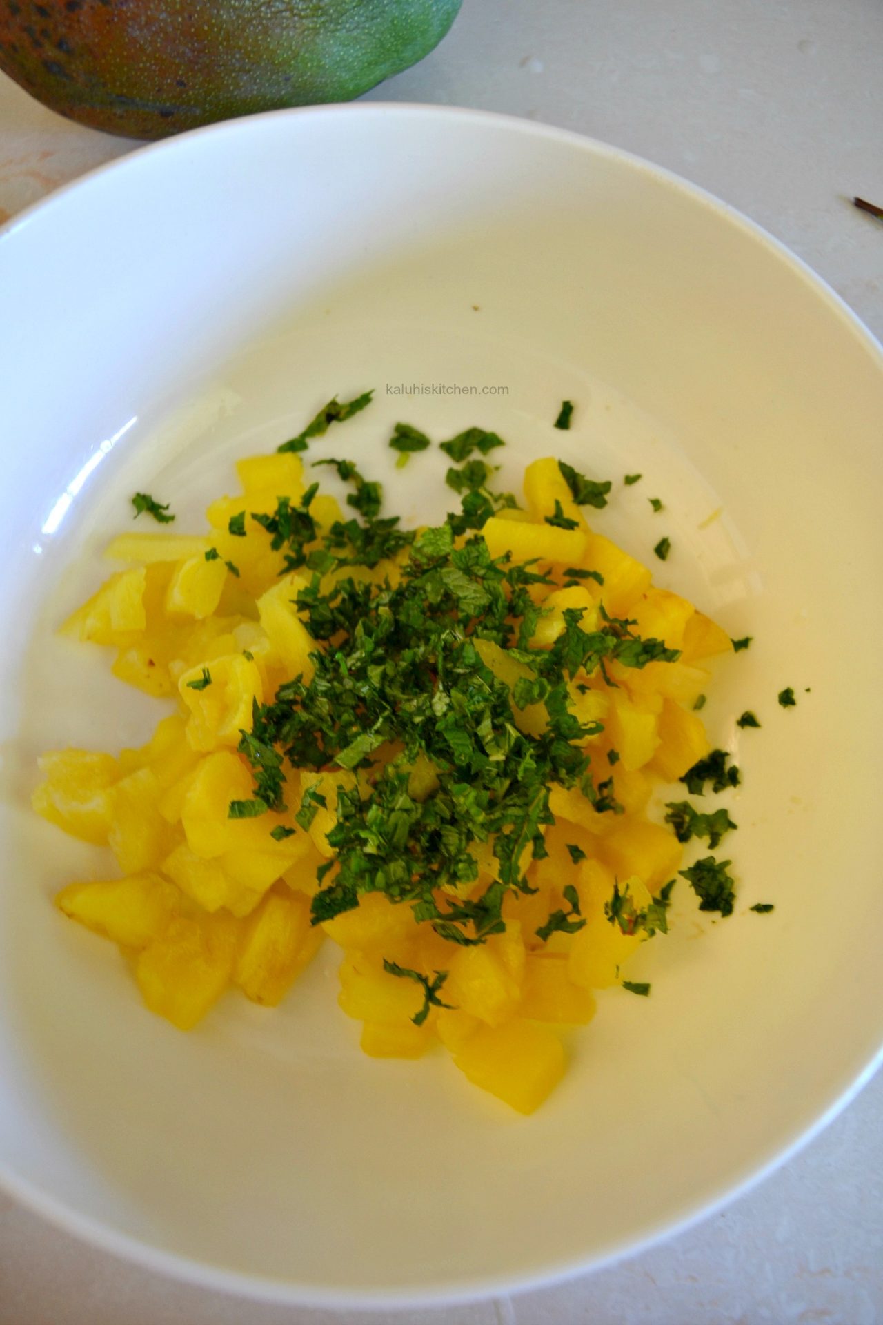 add the mint to the pineapple then allow it to sit for a while before serving_kaluhiskitchen.com