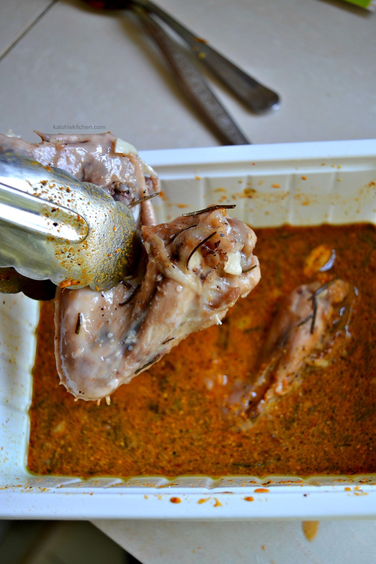 dip the chicken in the seasoning spices that have been made into a paste by adding abit of water_kaluhiskichen.com