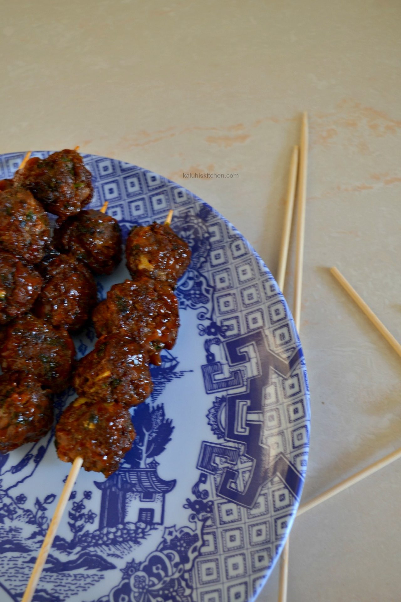 slather your mbuzi meatballs in barbeque sauce then proceed to skewer them_how to make mshikaki_kenyan food_kaluhiskitchen.com