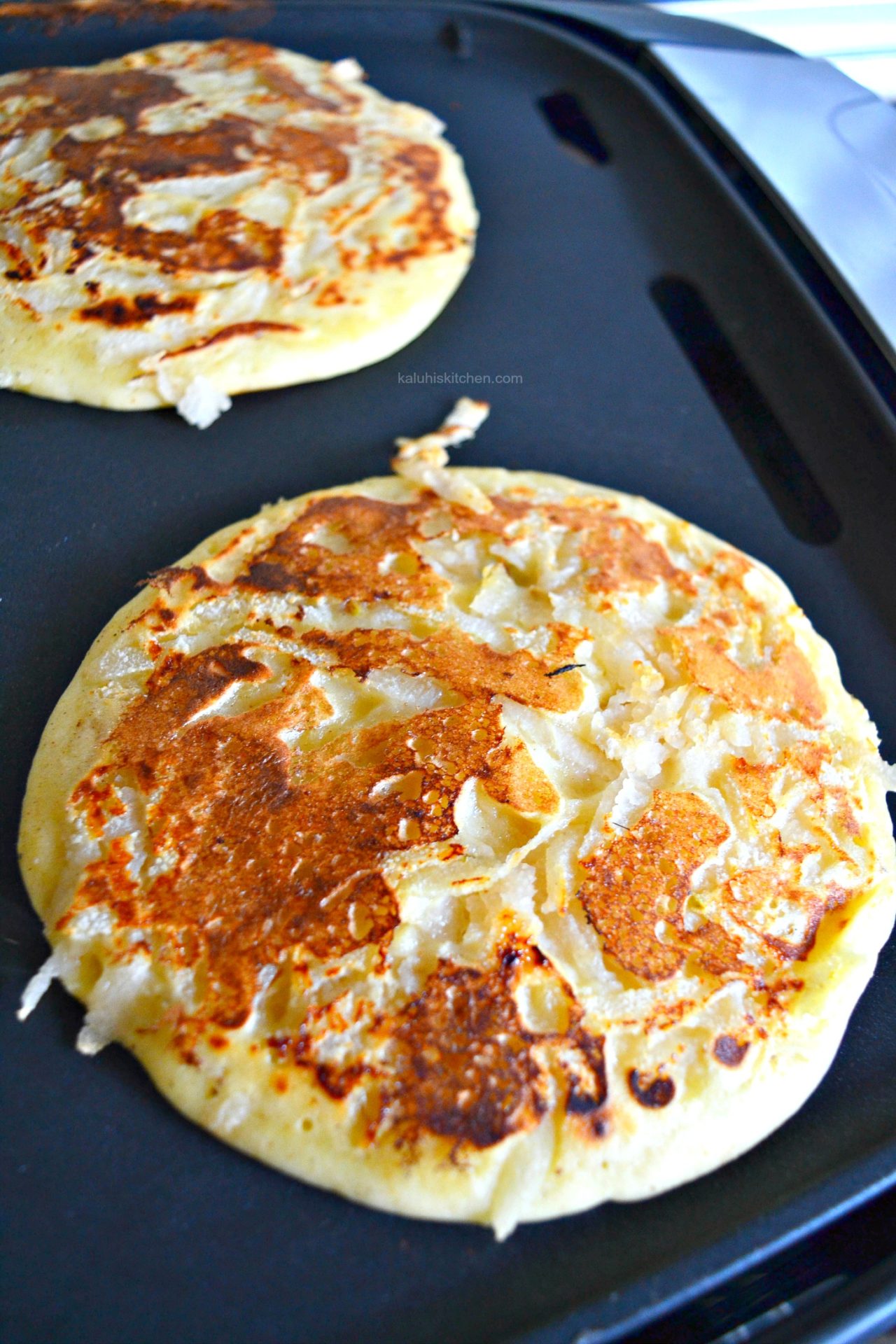 allow the pancake to sit on your pan for abot 5 minutes on each side to allow it to completely cook through_kaluhiskitchen.com_nutmeg and pear pancakes