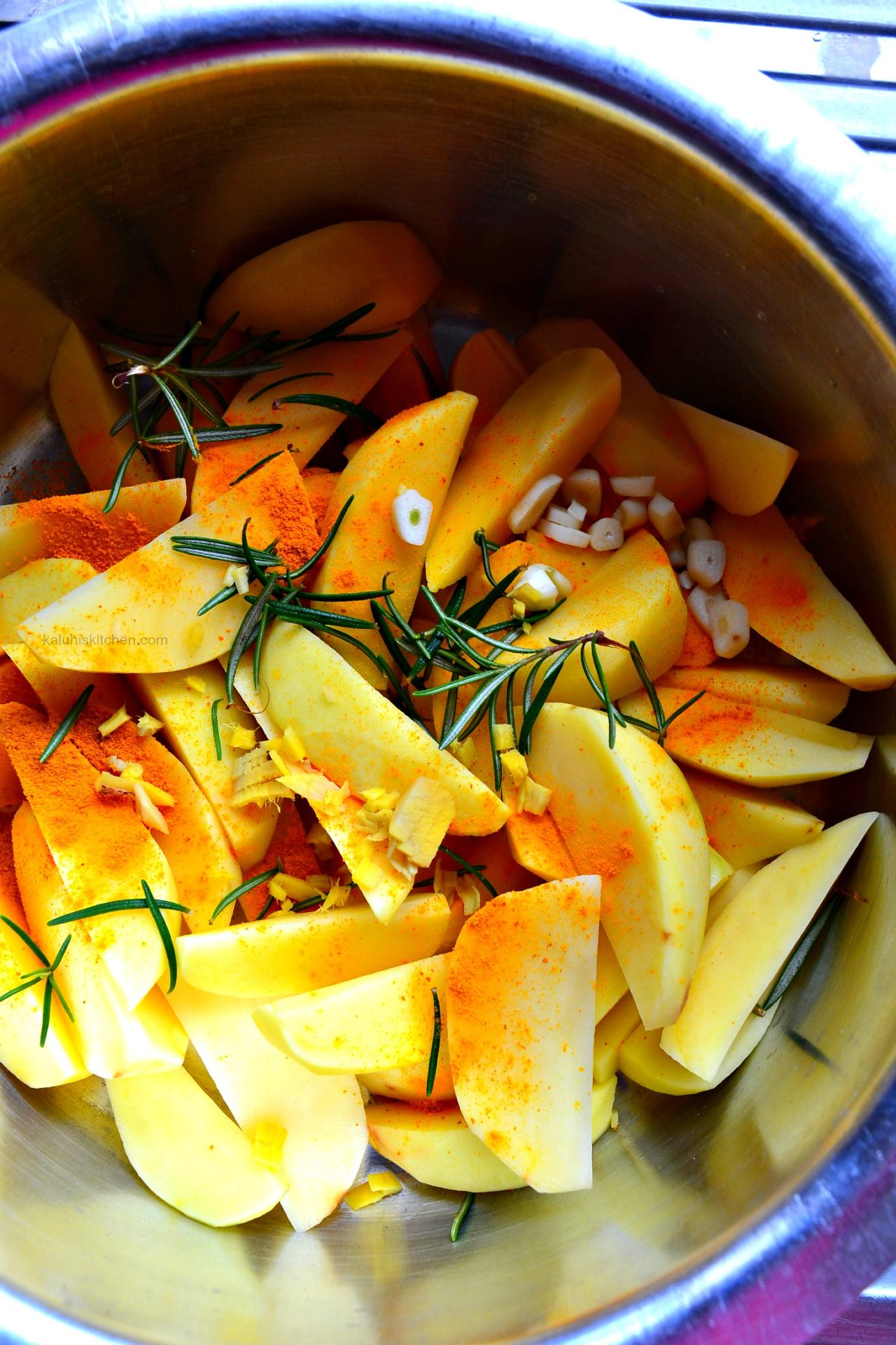 boil the turmeric with some fresh garlic, rosemary, ginger and turmeric ad the first phase of cooking your potato wedges_kaluhiskitchen.com_food bloggs kenya