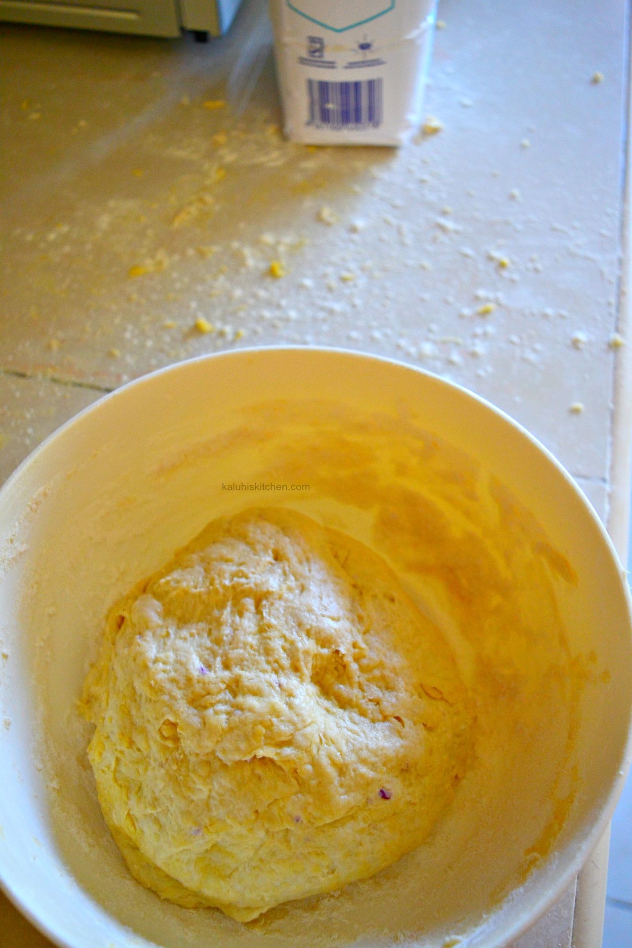 knead your dough and once it stops sticking on the sides, it is ready. Cover with cling film or a damp cloth and allow to rest for an hour_chapati dough_kaluhiskitchen.com