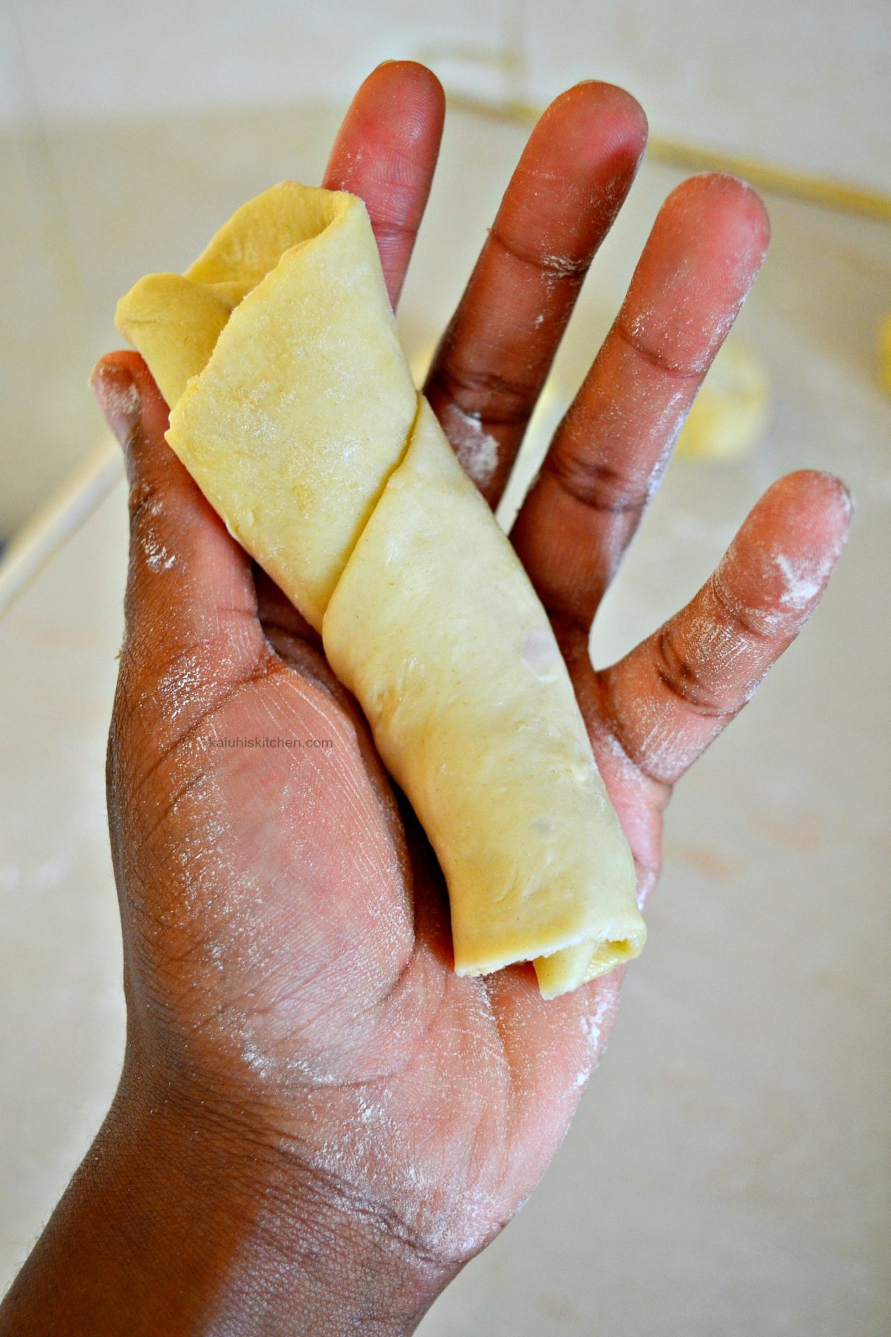 roll the dough until you form a cone_kaluhiskitchen.com_how to make chapati