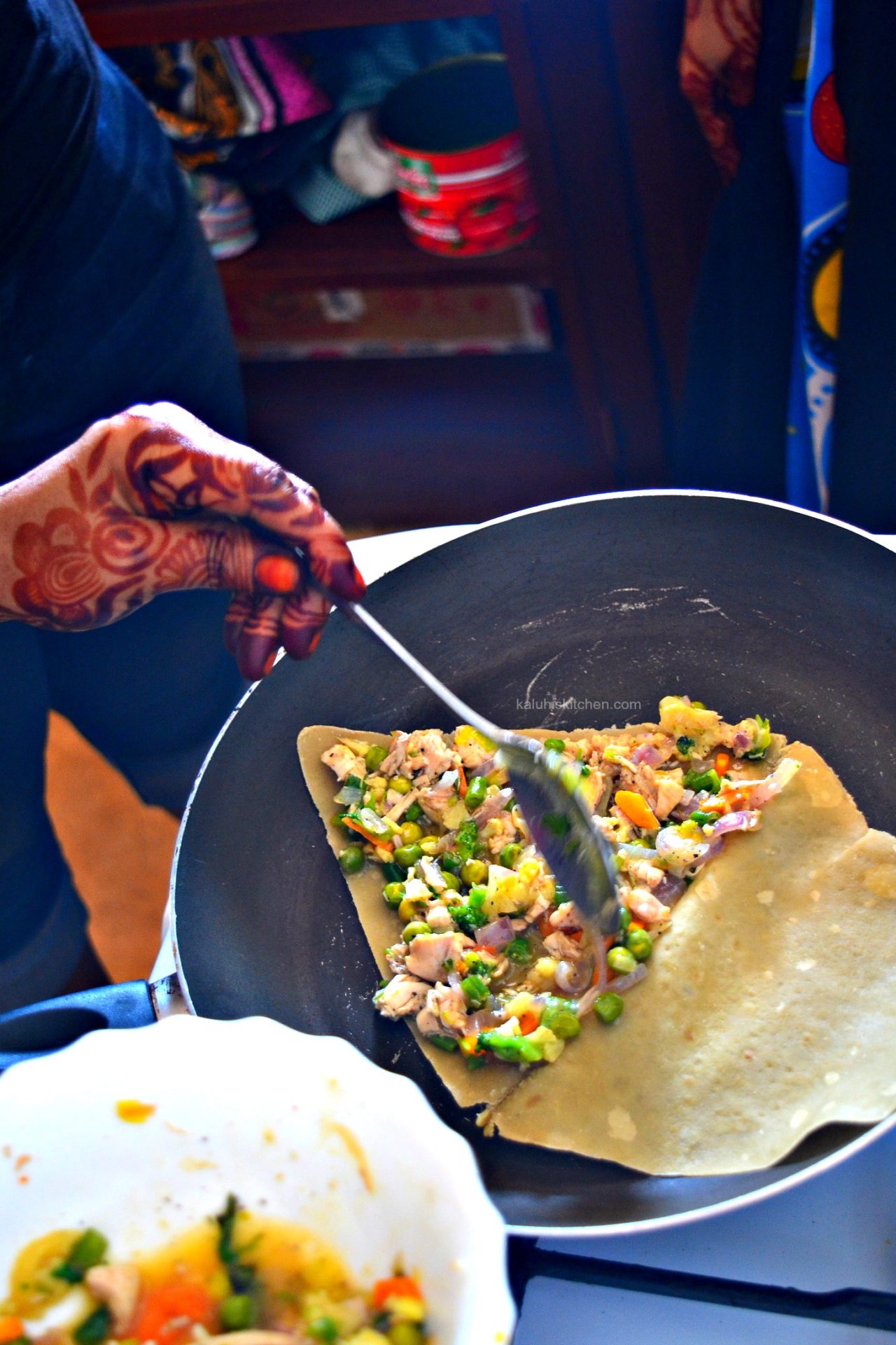 add the mkaki wa kulisha filling into the pastry about 14 an inch thich_swahili pizza_kaluhiskitchen.com