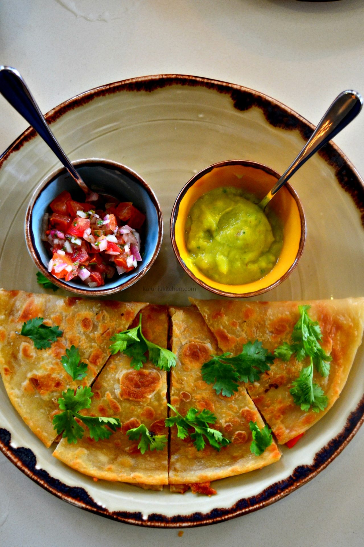 chapati quesadillas with kachumbari and guacamole served at nyamamama at yaya center