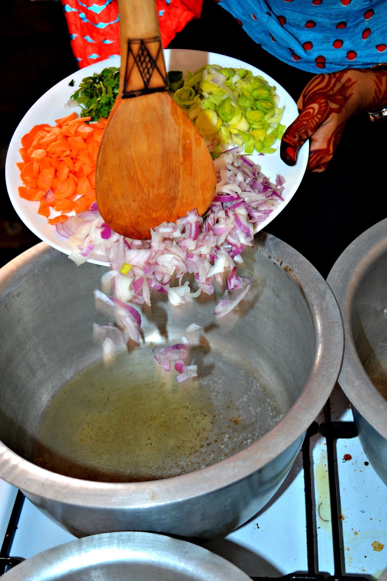 swahili pizza_begin by frying your onions, carrots, dhania until softened, swahili cooking class_kaluhiskitchen.com