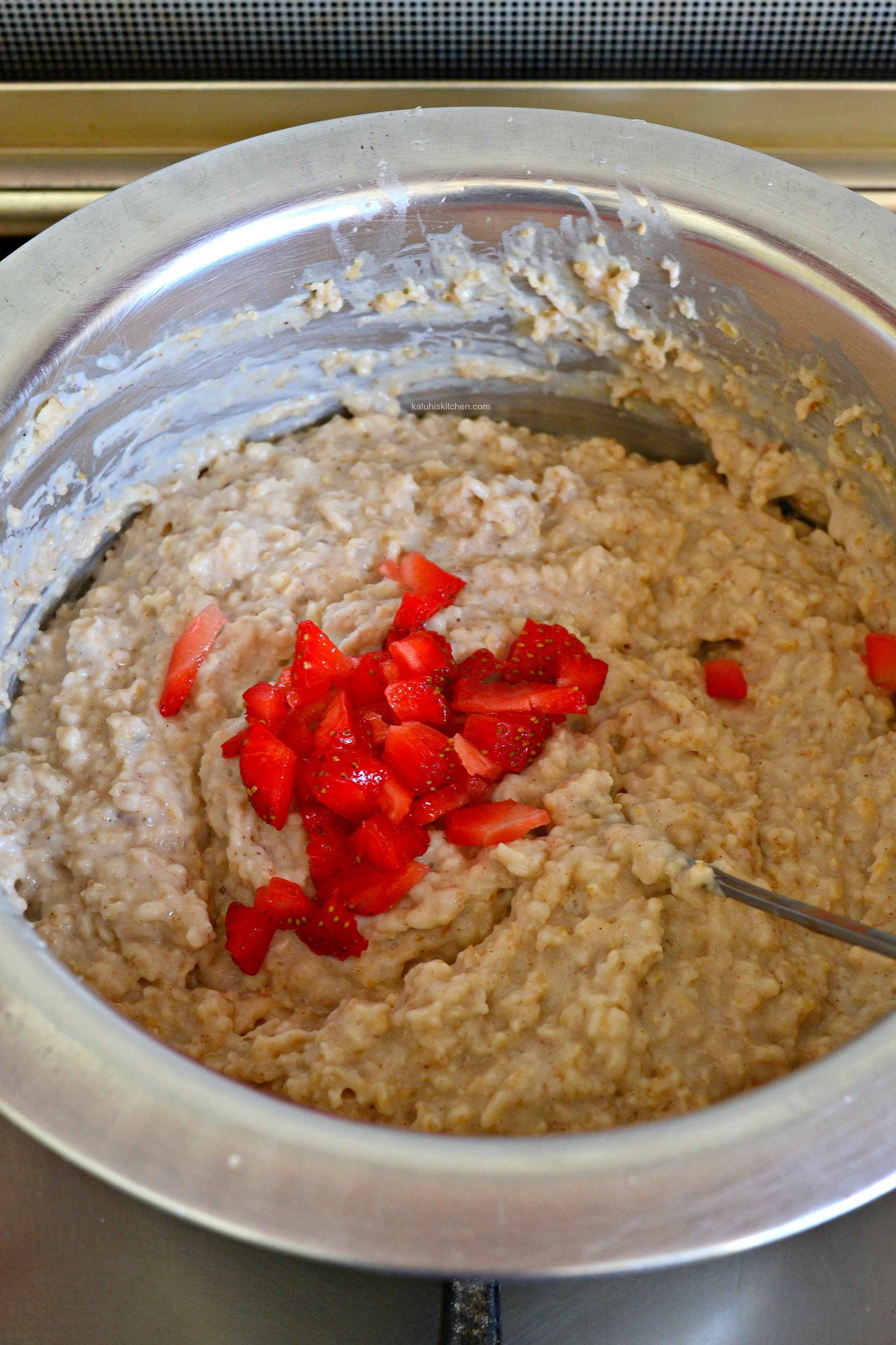 fold in your finely chopped strawberries into the oats for extra nutrients and flavor_kaluhiskitcen.com
