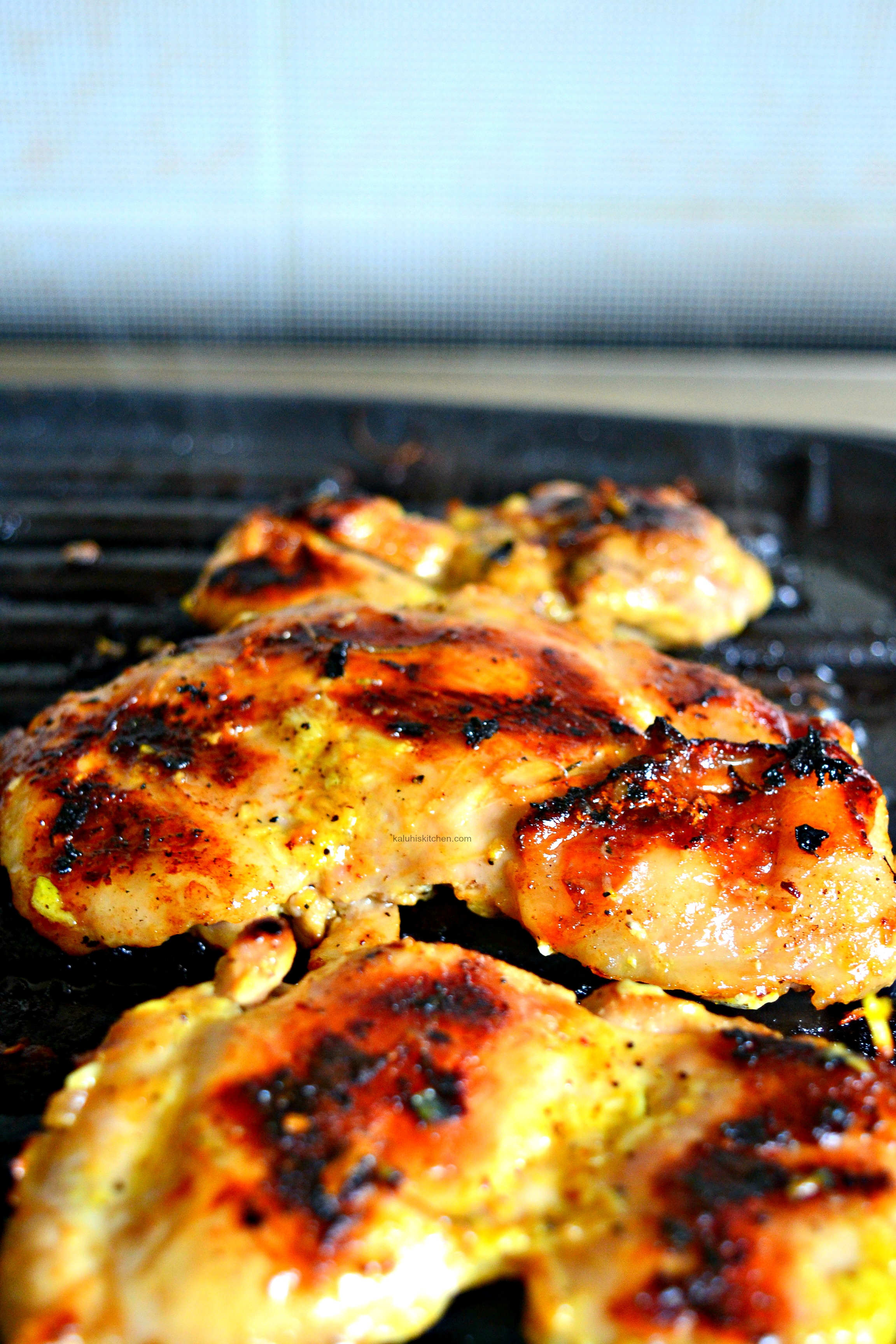 grill your chicekn together with the wet rub and allow it to cook through and get a good seer on the outside_kaluhiskitchen.com