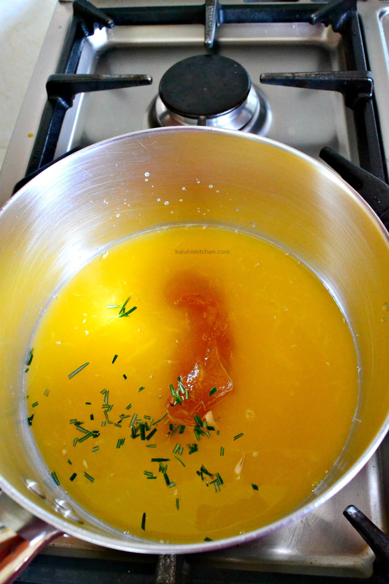 mix the honey, rosemary and fresh orange juice and allow it to simmer until it has thickened_how to make sweet potatoes crispy_kaluhiskitchen.com