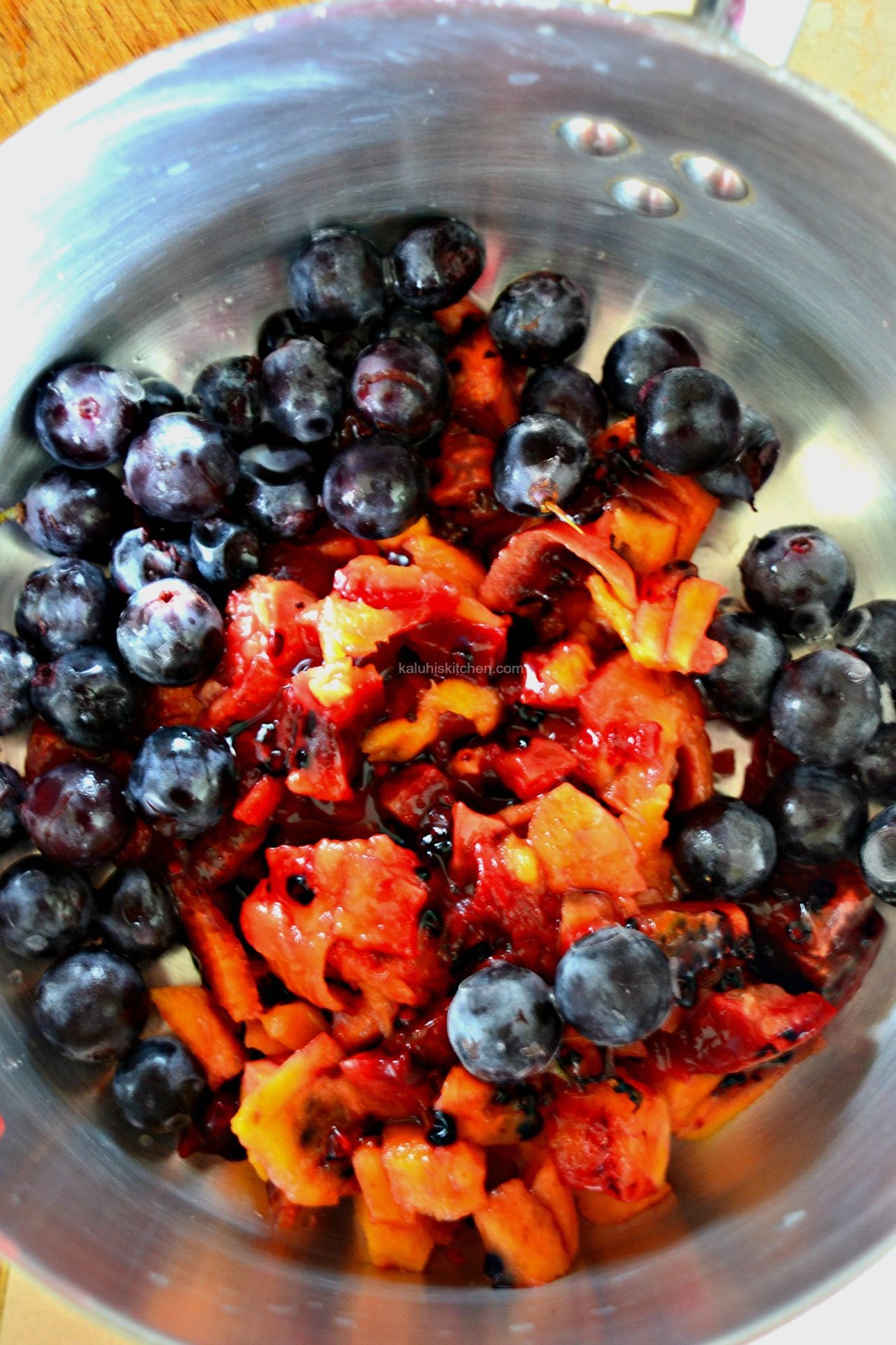 to make your jam, put the berries in a pan together with some sugar and 5 tabelspoons of granulated sugar_tree tomato and grape jam_kaluhiskitchen.com