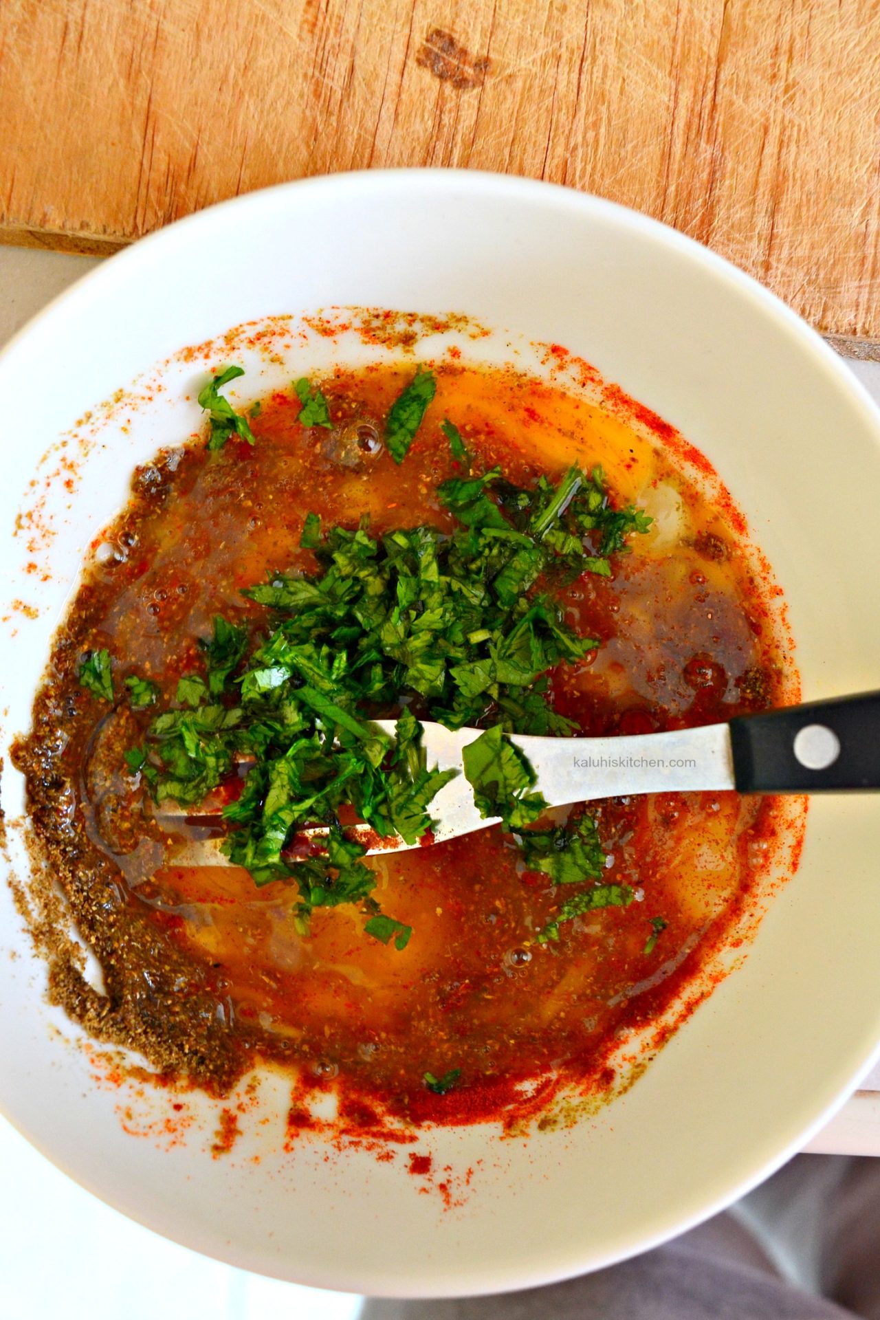 whisk in finely chopped coriander to add a more herby and fuller taste to the cassava_kaluhiskitchen.com_how to make paprika cassava_kenyan food