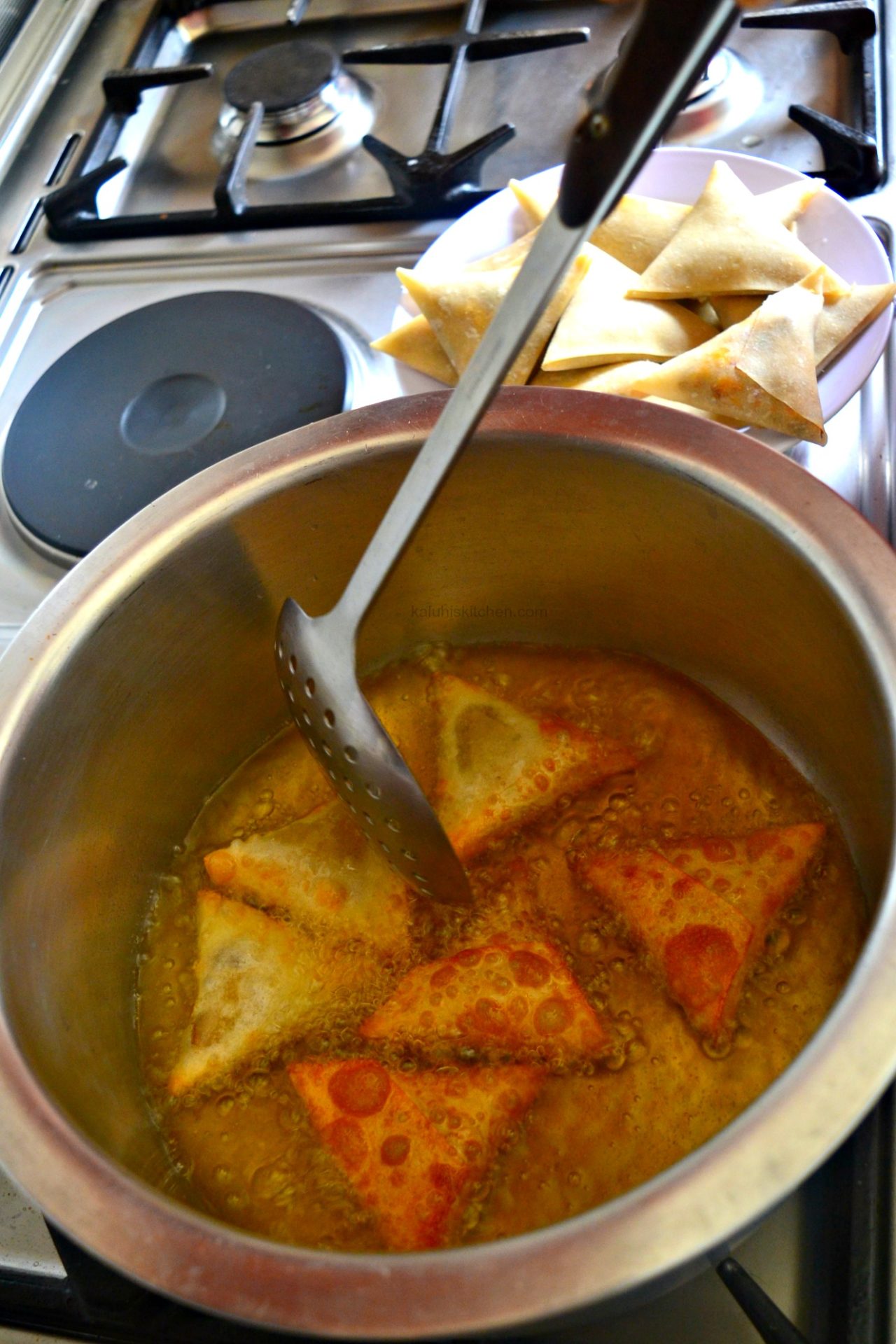 For your samosas, allow them to flash fry. Do not let them stay too long in the heat as they will get burnt. how to cook samosas_kenyan food_kaluhiskitchen.com