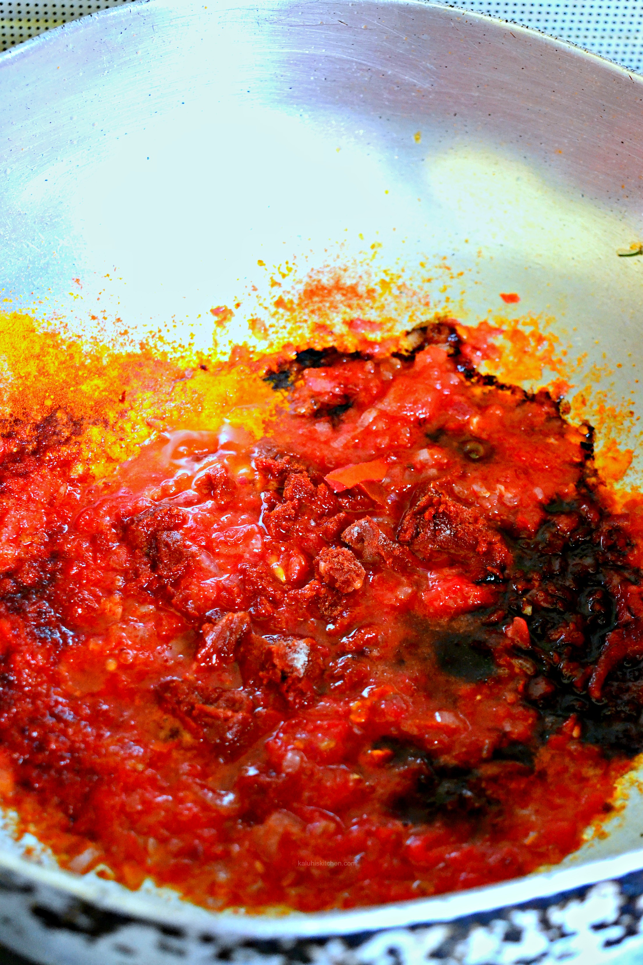 for-the-sauce-add-tomatoes-tomato-paste-the-spices-and-soy-sauce-to-the-sauteed-red-onion-and-allow-it-to-sommer-down-so-that-all-the-flavors-combine_kaluhiskitchen-com