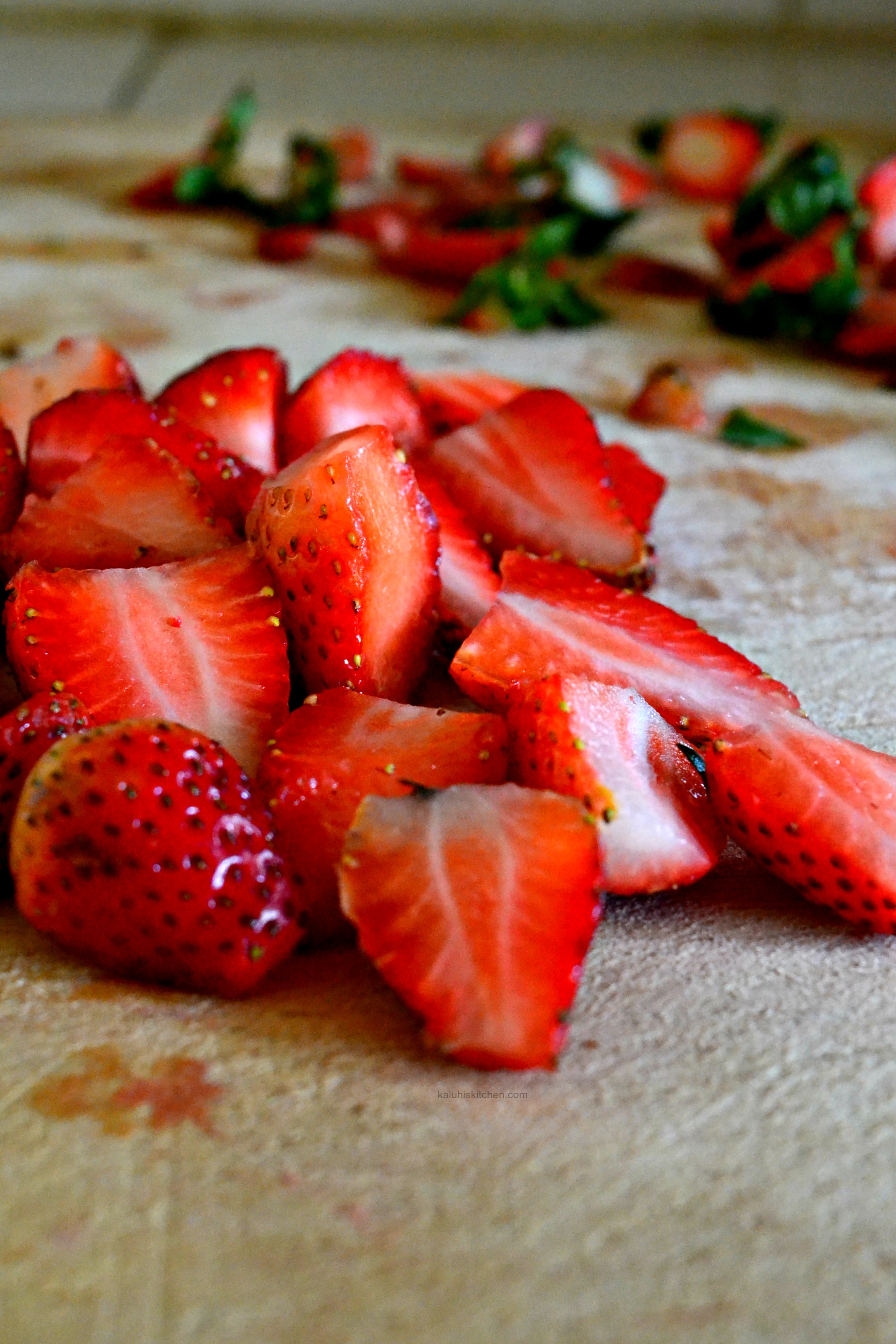 sliced-strawberries-for-making-a-strawberry-posset_kaluhiskitchen-com
