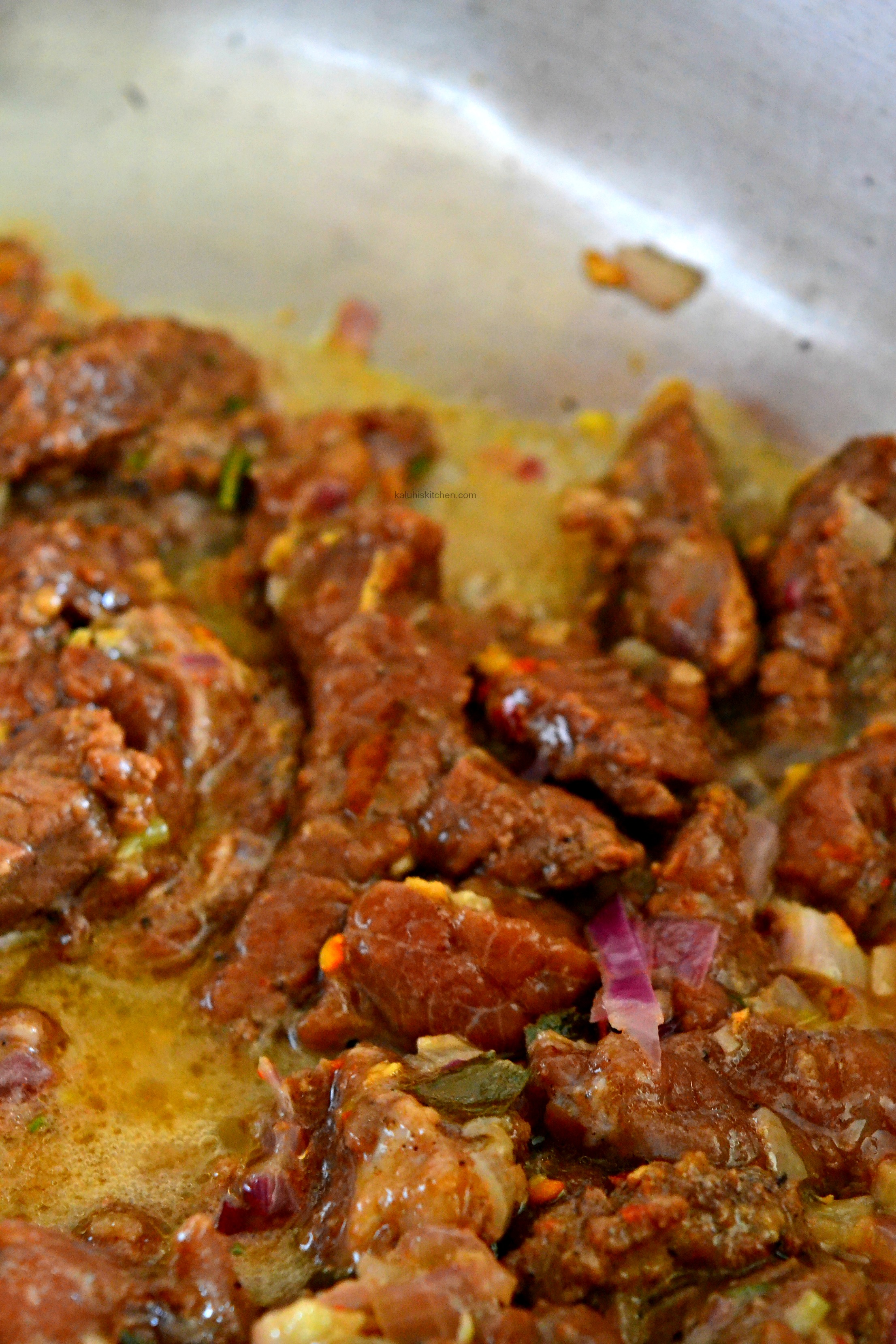 add-the-beef-to-the-onions-and-fry-it-on-high-heat-intil-fully-browned-on-the-outside_kaluhiskitchen-com_chili-and-coffee-marinated-beef-dry-fry