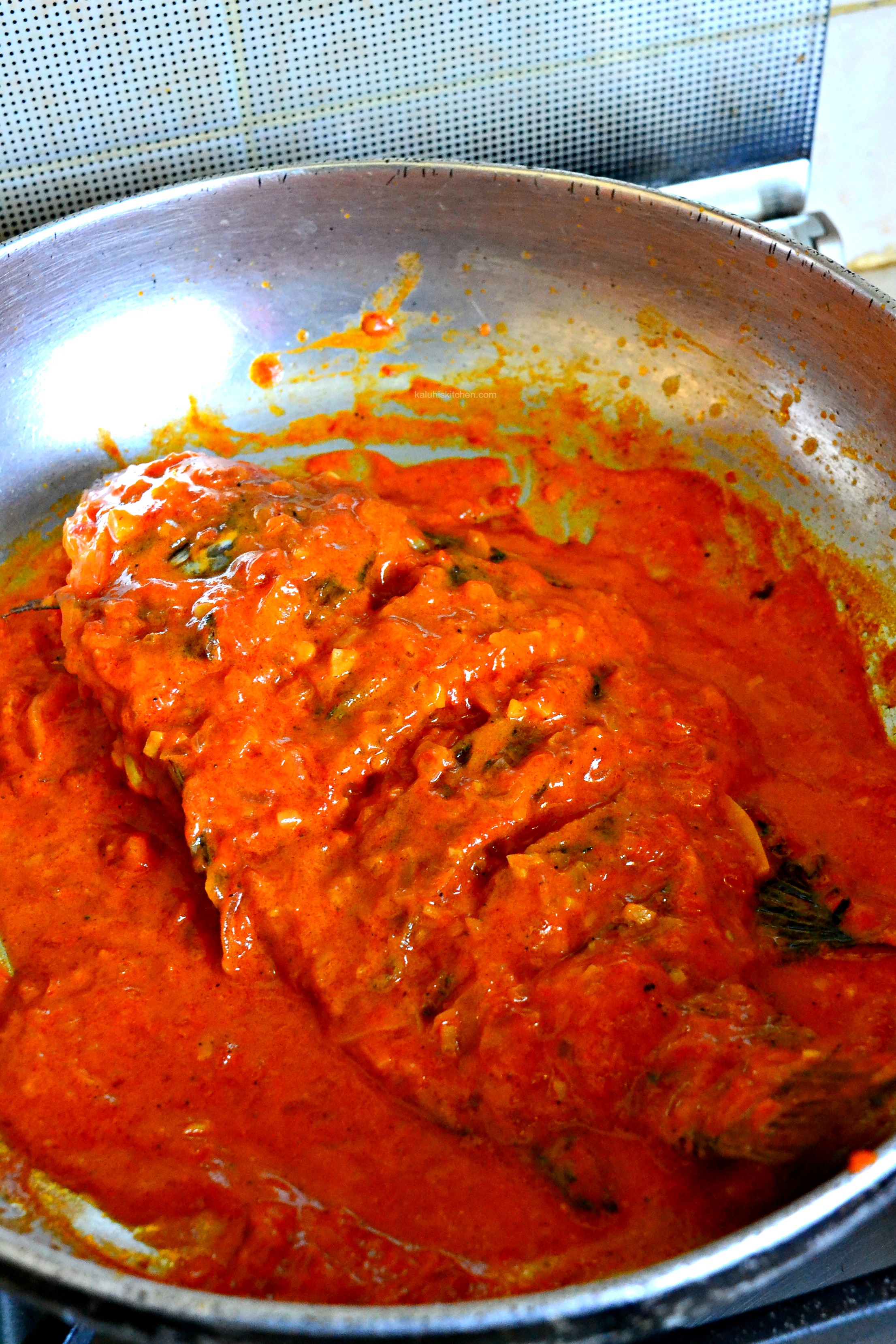 slather-the-scooped-out-tomato-mixture-over-the-fish-and-allow-it-to-simmer-down-for-about-5-10-minutes-for-all-flavors-to-meld_kaluhiskitchen-com
